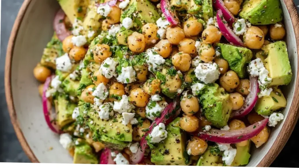 This is a refreshing, quick, and easy salad, perfect for a light lunch or a side dish. The creamy avocado, salty feta, and bright lemon dressing make it a favorite.